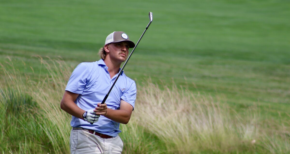 Nathan Piatt hitting his tee shot on hole #13
