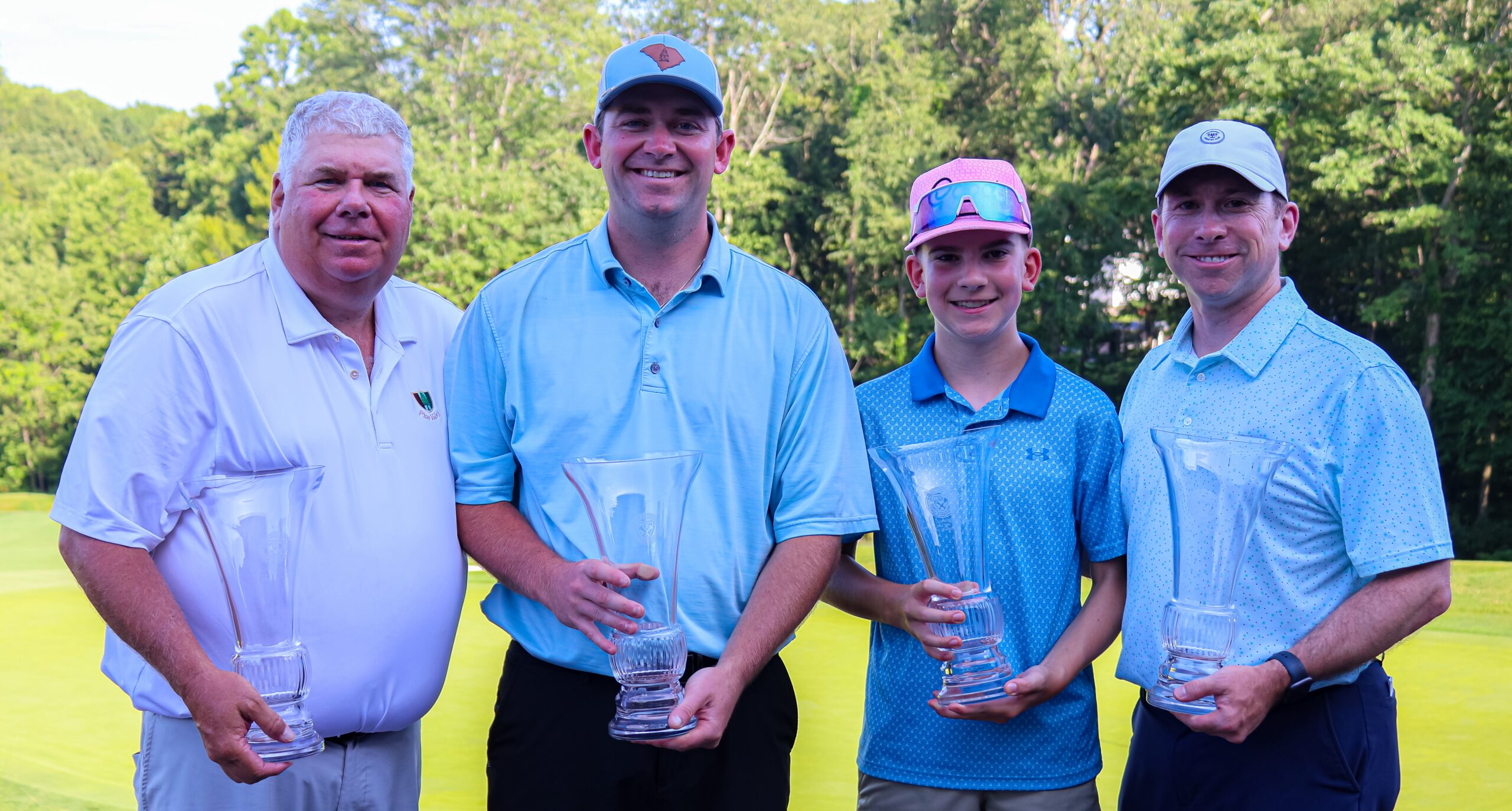 Father & Son Champions, Arnold & Arnie Cutrell (left), and Parent & Child Champions, Patrick & Chhirs Shipley (right) Father & Son Champions, Arnold & Arnie Cutrell (left), and Parent & Child Champions, Patrick & Chhirs Shipley (right)